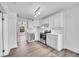 Modern kitchen featuring white cabinets, stainless steel appliances, and beautiful countertops at 3132 Umatilla St # B, Denver, CO 80211