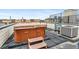 Rooftop deck includes a hot tub and great space for relaxing while enjoying spectacular city views at 2325 Walnut St # 4, Denver, CO 80205