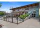 Exterior view of First Draft restaurant with an outdoor seating area and graffiti art at 2325 Walnut St # 4, Denver, CO 80205