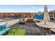Enjoy the rooftop deck with a hot tub, table with umbrella, and plenty of space for entertaining guests at 2325 Walnut St # 4, Denver, CO 80205