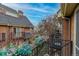 Exterior view of the balcony with flower boxes and neighborhood scenery at 999 N Emerson St # 9, Denver, CO 80218