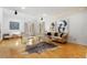 Sun-filled living room with hardwood floors, vaulted ceilings, elegant furnishings, and modern decor at 999 N Emerson St # 9, Denver, CO 80218