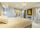 Cozy main bedroom featuring a fireplace, decorative wall art, and bright natural light at 999 N Emerson St # 9, Denver, CO 80218