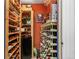 A well-organized wine cellar with wooden shelving, diverse bottle selection and storage for a connoisseur's collection at 999 N Emerson St # 9, Denver, CO 80218