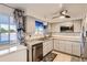 Well-lit kitchen with modern appliances, ample counter space, and functional layout at 6495 E Happy Canyon Rd # 79, Denver, CO 80237