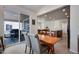Open-concept dining area with sliding glass doors to the patio at 16470 Mountain Flax Dr, Monument, CO 80132