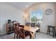 Bright dining area with vaulted ceilings and ample natural light at 16470 Mountain Flax Dr, Monument, CO 80132