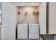 Laundry room with side-by-side washer and dryer at 16470 Mountain Flax Dr, Monument, CO 80132
