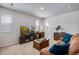 Stylish living room boasts contemporary furnishings, natural light, and tasteful decorative accents at 16470 Mountain Flax Dr, Monument, CO 80132