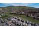 Panoramic aerial view of a residential community nestled in a scenic mountain landscape at 15576 W Washburn Cir, Lakewood, CO 80228