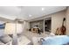 Large basement area with comfortable seating and entertainment center at 6945 N Fargo Trl, Littleton, CO 80125