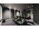 Home theater with reclining seats, projector, and a large screen for an immersive viewing experience at 6945 N Fargo Trl, Littleton, CO 80125