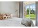 Bright bedroom with sliding doors to the outside at 7440 S Blackhawk St # 14-103, Englewood, CO 80112