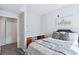Comfortable bedroom with a desk and a closet at 7440 S Blackhawk St # 14-103, Englewood, CO 80112
