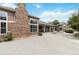 Exterior view of the community clubhouse and patio at 7440 S Blackhawk St # 14-103, Englewood, CO 80112