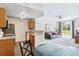 Open concept kitchen and living room with lots of natural light at 7440 S Blackhawk St # 14-103, Englewood, CO 80112
