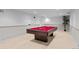 Finished basement with a classic pool table, perfect for entertaining guests at 6243 S Elati St, Littleton, CO 80120