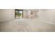Finished basement with sliding glass doors providing access to the outdoors at 8092 Ponderosa Ln, Parker, CO 80138