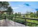 This beautiful deck offers serene outdoor space, surrounded by lush greenery, and scenic views at 8092 Ponderosa Ln, Parker, CO 80138