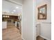 View of kitchen from living space; stainless steel appliances and open concept design at 8092 Ponderosa Ln, Parker, CO 80138