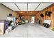 Spacious garage interior showing ample storage and an exit door to the backyard at 4129 Zenobia St, Denver, CO 80212