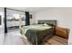 Bedroom featuring a balcony access, and lots of natural light at 4129 Zenobia St, Denver, CO 80212