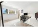 Well-lit home office with a modern desk setup, offering a productive and stylish workspace at 4129 Zenobia St, Denver, CO 80212