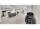 Spacious basement featuring a stone fireplace, comfortable seating, and space for entertainment and relaxation at 860 Waite Dr, Boulder, CO 80303