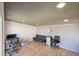 Basement flex space featuring modern desk, futon, and mini-fridge perfect for working from home at 860 Waite Dr, Boulder, CO 80303