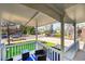 Relaxing front porch with comfortable seating and a view of the neighborhood street at 860 Waite Dr, Boulder, CO 80303