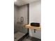 Stylish bathroom featuring a unique black sink and a glass-enclosed shower with mosaic tile at 4303 Osceola St, Denver, CO 80212