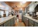 Vintage-style kitchen with stainless steel appliances and ample counter space at 715 Main St, Georgetown, CO 80444