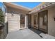 Charming balcony with privacy awning, overlooking a wooded area, and offering multiple access points at 28110 Meadow Dr, Evergreen, CO 80439