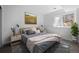 Cozy bedroom with carpet flooring, soft lighting, and modern decor at 28110 Meadow Dr, Evergreen, CO 80439