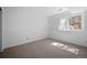 Minimalist bedroom with neutral carpet, offering a blank canvas for a calming and personalized space at 28110 Meadow Dr, Evergreen, CO 80439