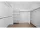 Walk-in closet with built-in shelving and ample storage space at 28110 Meadow Dr, Evergreen, CO 80439
