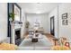 Inviting living room featuring a fireplace, cozy seating, and elegant decor creating a welcoming atmosphere at 2647 N High St, Denver, CO 80205