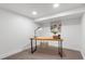 Bright office space with a simple desk and chair setup with good lighting at 2647 N High St, Denver, CO 80205