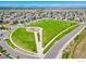 Beautiful aerial view of a Primary-planned community featuring parks, green spaces, and well-maintained streets at 2122 Opal Ave, Brighton, CO 80603