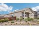A well maintained single Gathering home featuring an inviting front porch with decorative stone accents at 2122 Opal Ave, Brighton, CO 80603