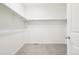 This walk-in closet provides plenty of space for your clothes and accessories with carpeted floors at 2122 Opal Ave, Brighton, CO 80603