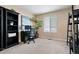 Home office with desk, shelving and large window at 1668 Rosemary Dr, Castle Rock, CO 80109