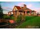 Attractive exterior of a home with a lush green lawn and architectural details at 24965 E Roxbury Pl, Aurora, CO 80016