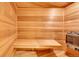 Custom built sauna offers a tranquil spa-like experience with light wood and integrated seating at 24965 E Roxbury Pl, Aurora, CO 80016