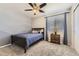 Comfortable bedroom with mountain mural, carpeted floors, and a large window at 25621 E Cedar Pl, Aurora, CO 80018