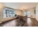 Dining room featuring bay window with backyard view and exterior access at 5485 E Bails Dr, Denver, CO 80222