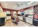 Bright kitchen featuring stainless steel appliances and custom cabinetry at 5485 E Bails Dr, Denver, CO 80222