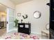 The stylish office space includes a sliding door, a bookshelf, and decor at 6657 S Kline Way, Littleton, CO 80127