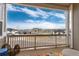 Patio view shows an array of neighborhood homes and blue skies at 6657 S Kline Way, Littleton, CO 80127