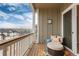 Cozy patio seating provides a relaxing space to enjoy the views at 6657 S Kline Way, Littleton, CO 80127